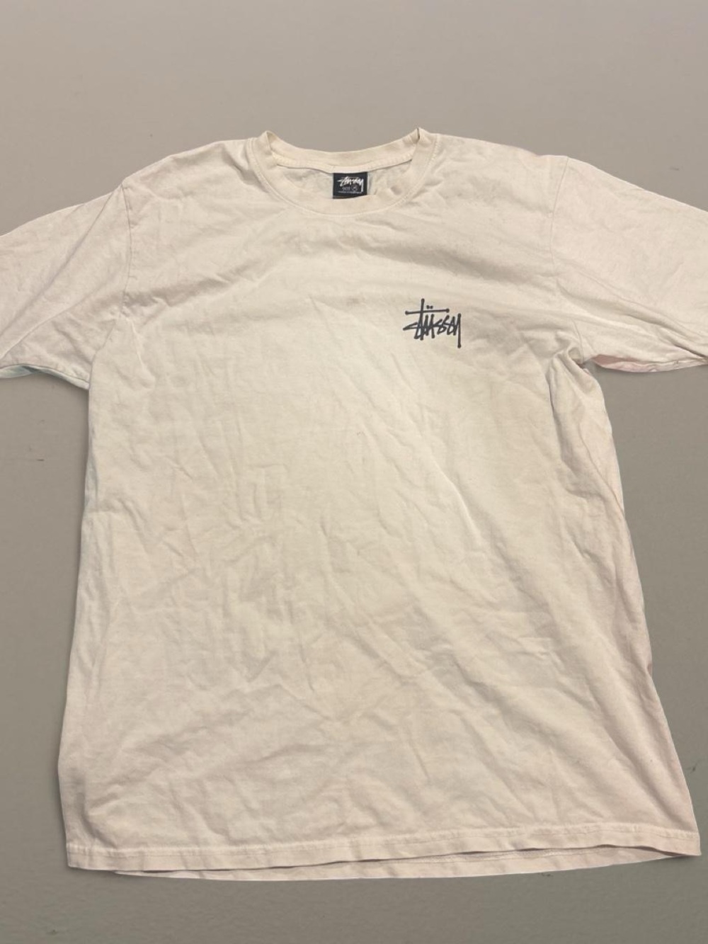 Men’s medium cream stussy tee